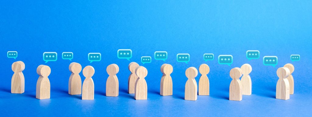 Many people figures and comment clouds above. process of discussion and commenting, the search for fresh ideas. Best thought, good idea, positive feedback. Opinion of the public and surrounding people